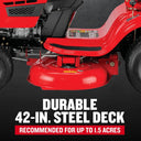 Red lawn mower with a durable 42-inch steel deck on a black background
